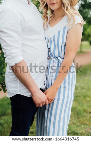 beautiful couple holding hands and hugging
