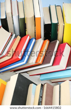 Multicolored books on the table