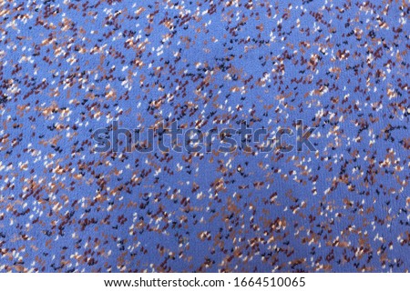Abstract blue fibrous background with white, black, brown round dots, spots. texture blue background with dots. full screen wallpaper.