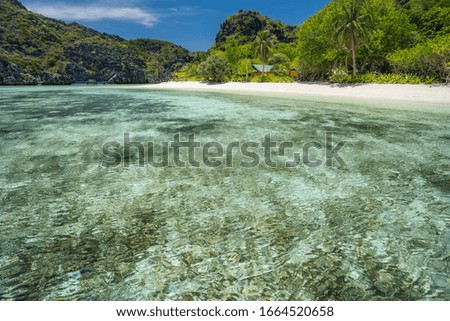Empty shallow star beach at Tapiutan Island. El Nido, Palawan, Philippines Royalty-Free Stock Photo #1664520658