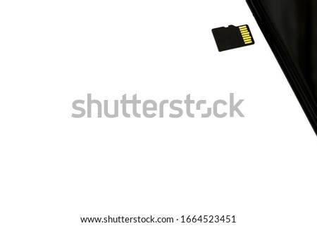Concept of data storage, flash memory, micro SD card on a white background Memory cards are used for storing digital data in portable electronic devices.