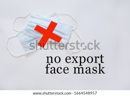Text No export face mask., the red cross and medical protective mask on a white background. New coronavirus 2019-nCoV, middle East respiratory syndrome coronavirus MERS-Cov middle East respiratory Royalty-Free Stock Photo #1664548957