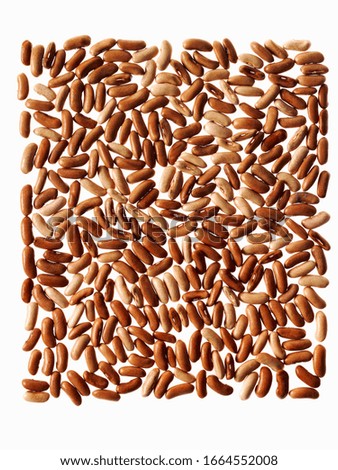 Grains of rice arranged in a pattern.