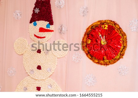 Snowman and clock. Winter decorative Christmas background.
