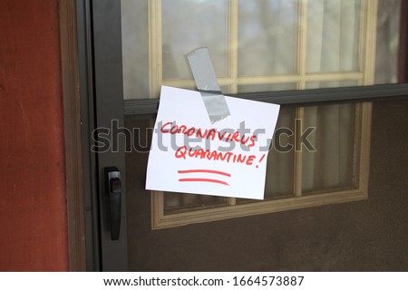 Self Quarantine door sign for front of house, because of Coronavirus (2019-nCoV)(Sars-CoV-2)(COVID-19). corona qourintine quaranitne quarentied quarrantined quaranteen qourantine quaratine qurantine Royalty-Free Stock Photo #1664573887