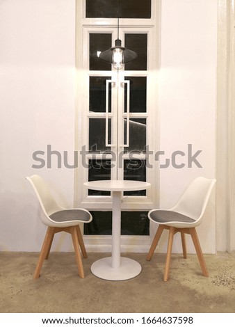 set of table and chairs in cafe interior