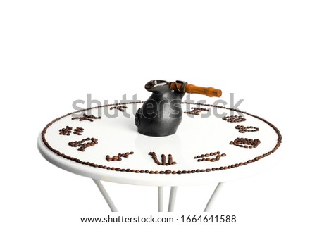 drawing of coffee beans in the form of zodiac signs on a table isolated on a white background
