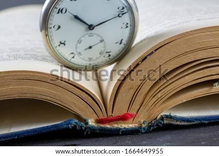 Book and Pocket Watch, Read concept