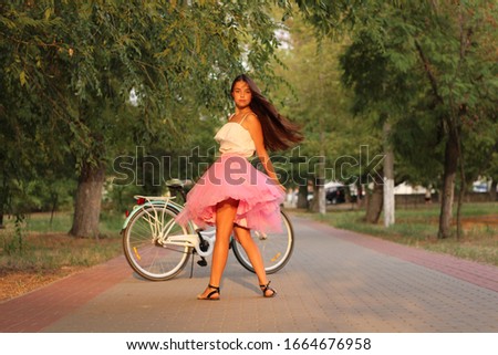 the girl with a bicycle