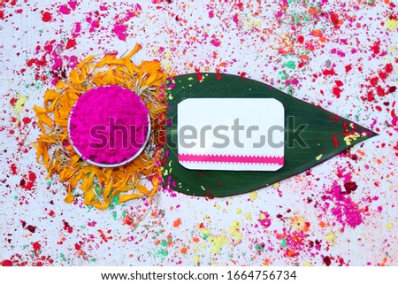 Traditional celebration greeting for colorful holi festival with color, gulal and blank space card for text in traditional pattern