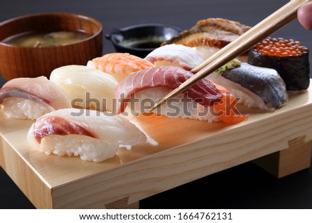nigirizushi japanese traditional sushi foods sashimi Royalty-Free Stock Photo #1664762131