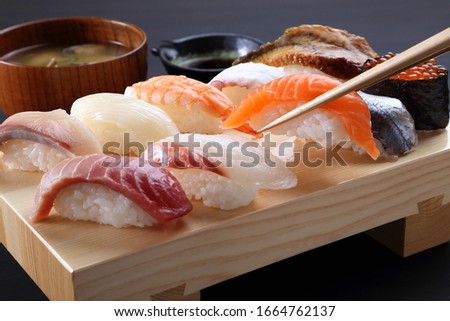 nigirizushi japanese traditional sushi foods sashimi Royalty-Free Stock Photo #1664762137