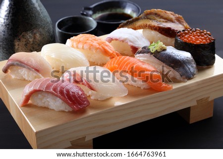 nigirizushi japanese traditional sushi foods sashimi Royalty-Free Stock Photo #1664763961