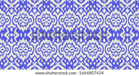 Lace border. Ikat seamless pattern. Vector tie dye shibori print with stripes and chevron. 