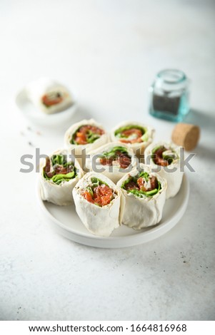 Salmon cream cheese rolls with lettuce