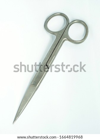 Surgical chrome steel scissors In White Isolated Background.