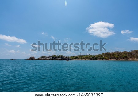 beautiful soft wave clear blue transparency sea ocean water and rocks at the bottom of the tropical paradise beach coast summer sea view at Samed Island, Rayong, Koh Samet, Thailand.
