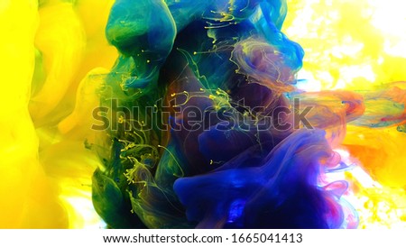 Color drops in water , abstract color mix , drop of Ink color mix paint falling on water Colorful ink in water, 
