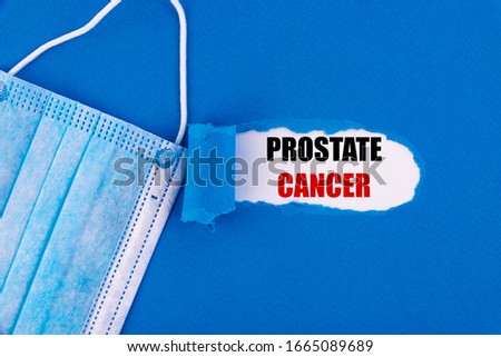 The text Prostate cancer appearing behind torn blue paper. Royalty-Free Stock Photo #1665089689