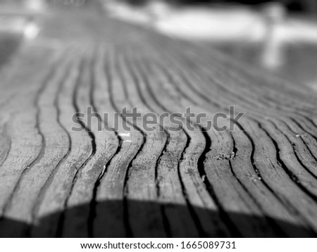 Selective focus empty wooden table or floor on blurred sweet pastel vintage bokeh background.(black and white photo)