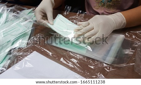 surgical mask: Medical disposable sterile masks Royalty-Free Stock Photo #1665111238