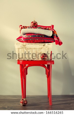 Christmas Country Gifts on a red chair, toned picture