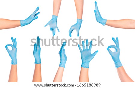 set of  female doctor`s hands in blue glove  isolated on white background
