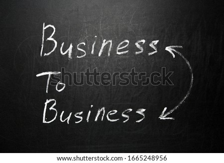 Business to business sign written with chalk on blackboard.