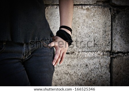 Grungy Asian Teenager Hand, Arms and Lower Body Detail