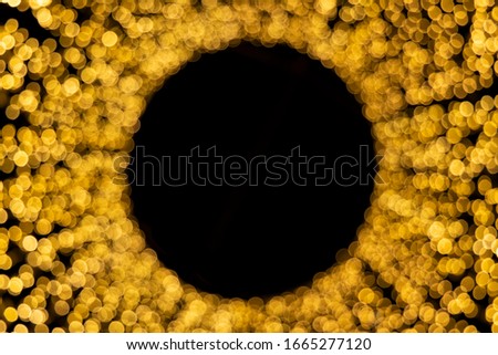 abstract unfocused festive golden illumination decoration object bokeh effect black circle shape in center empty copy space for your text here any holidays concept picture 