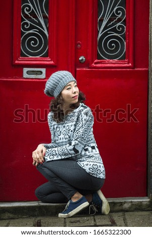 Beautiful asian woman on a street in old town.
