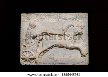 Relief depicting a chariot race in Istanbul Archaeology Museum, Turkey.