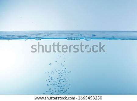 Abstract Water bubble drops splash. Blue color nature background
