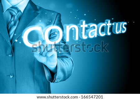 Businessman pushing CONTACT US sign Royalty-Free Stock Photo #166547201