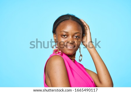 Cheerful women african appearance smile studio blue background