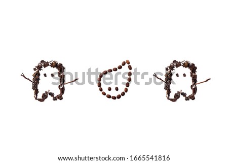 Halloween themed shapes made with roasted coffee beans and dried tea leaves placed on white background from the top view has space for your messages