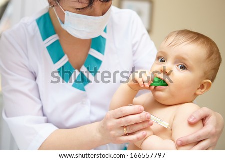 Baby health care and treatment. Medical symptoms. Temperature measurement