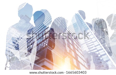 Double expose of manager team silhouettes over modern cityscape background Royalty-Free Stock Photo #1665603403