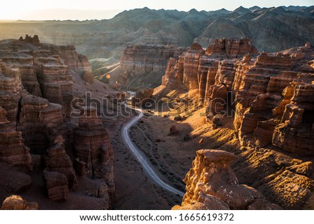 Panoramic view of Charyn Canyon in Kazakhstan near Almaty during sunrise taken from the top of cliff