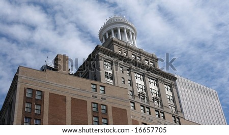 new orleans buildings against a blue sky background