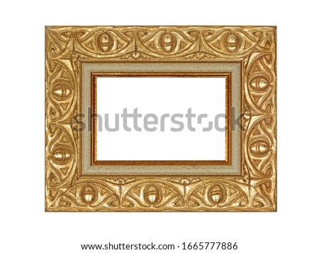 Empty wooden frame for paintings with gold patina. Isolated on white background