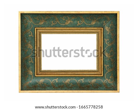 Empty green wooden frame for paintings with gold patina. Isolated on white background