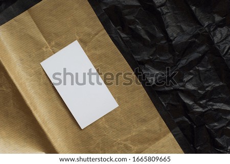 Stock Photo - Photo of blank business card with soft shadows on eco paper background. For design presentations and portfolios.