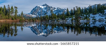Mt Shuksan reflection in lake Royalty-Free Stock Photo #1665857215