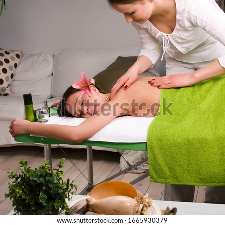 stock photo attractive lady getting spa treatment in salon, healthcare people concept