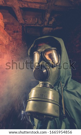 environmental disaster man wearing gas mask