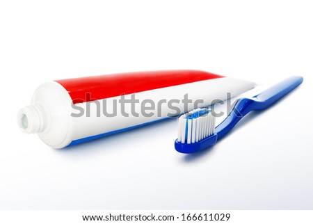 Toothbrush and toothpaste isolated on a white background. Royalty-Free Stock Photo #166611029
