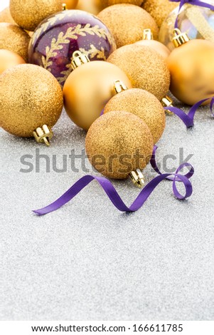 Golden christmas balls background.