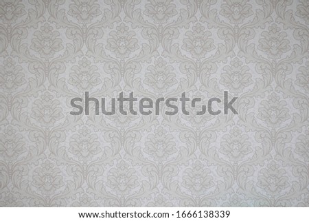 Neutral decorative wallpaper shot in the room