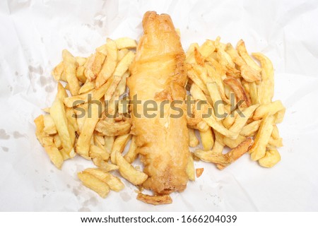 Fish and Chips from an English Fish and Chip shop Royalty-Free Stock Photo #1666204039
